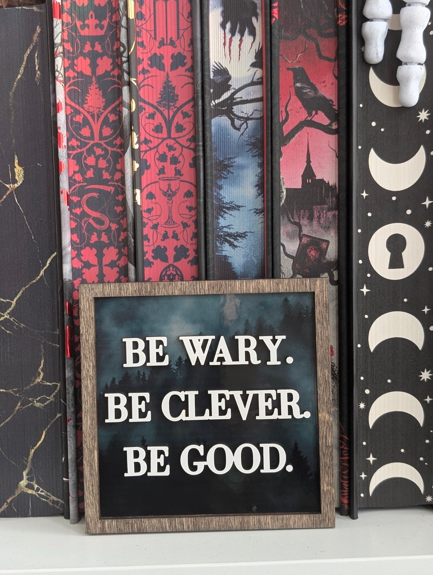 Be Wary. Be Clever. Be Good. One Dark Window Illustrated Bookshelf Sign