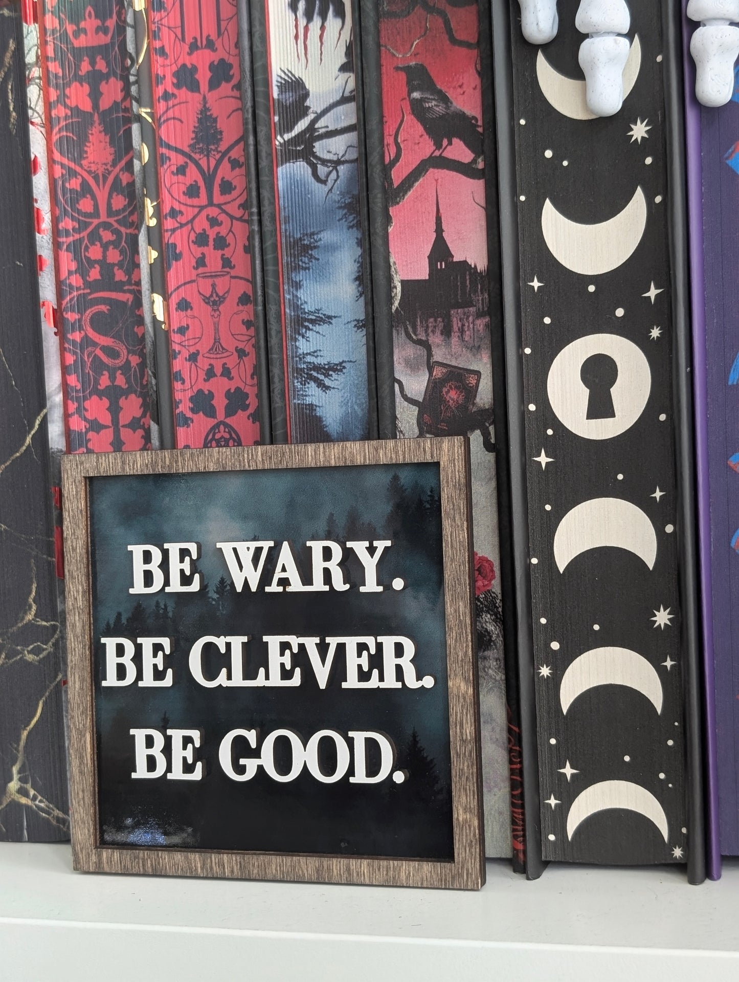 Be Wary. Be Clever. Be Good. One Dark Window Illustrated Bookshelf Sign